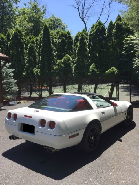 White 1993 Chevrolet Corvette Coupe with Red interior