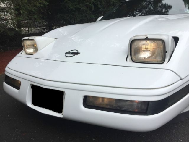 White 1993 Chevrolet Corvette Coupe with Red interior