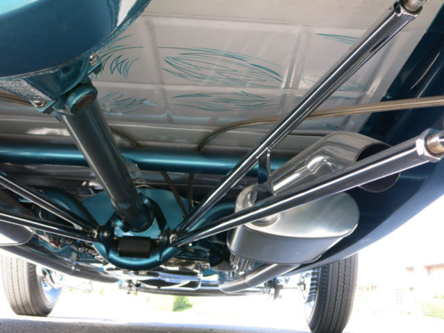 Turquoise 1929 Ford Model A Roadster with Turquoise and White interior
