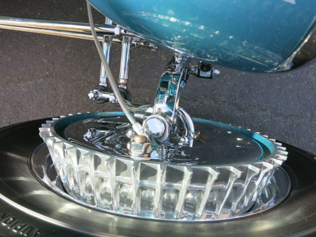Turquoise 1929 Ford Model A Roadster with Turquoise and White interior