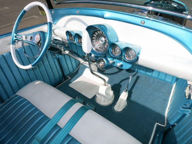 Turquoise 1929 Ford Model A Roadster with Turquoise and White interior