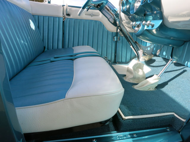 Turquoise 1929 Ford Model A Roadster with Turquoise and White interior