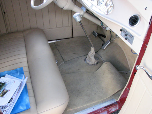 red 1930 Ford Model A Coupe with Tan interior