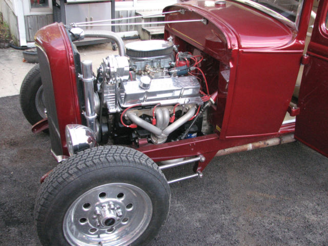 red 1930 Ford Model A Coupe with Tan interior