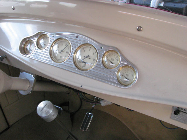 red 1930 Ford Model A Coupe with Tan interior