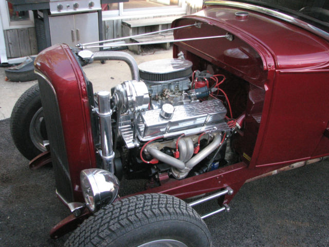 red 1930 Ford Model A Coupe with Tan interior