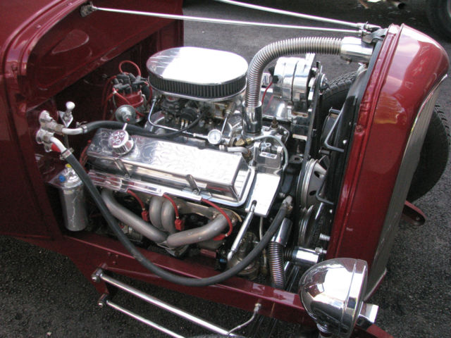 red 1930 Ford Model A Coupe with Tan interior