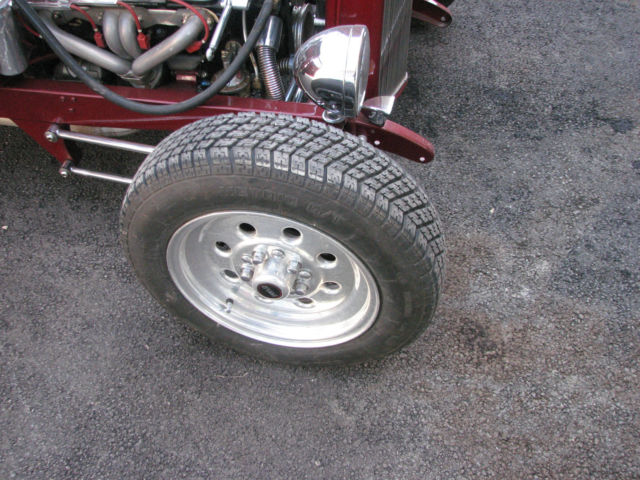 red 1930 Ford Model A Coupe with Tan interior