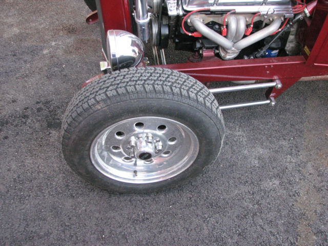 red 1930 Ford Model A Coupe with Tan interior