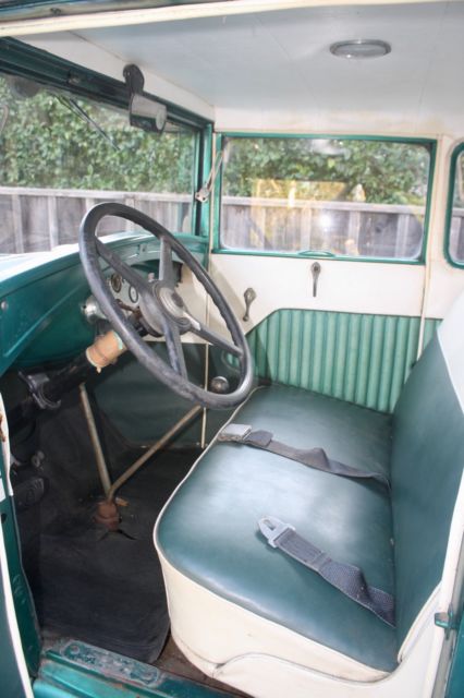 Green 1930 Ford Model A Coupe with White / Green interior