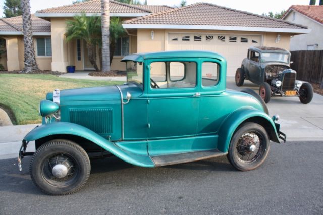 Green 1930 Ford Model A Coupe with White / Green interior