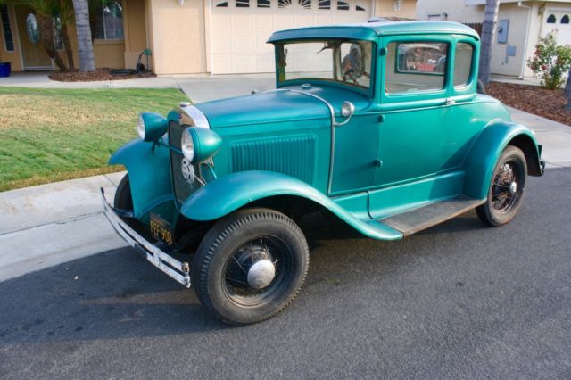 Green 1930 Ford Model A Coupe with White / Green interior