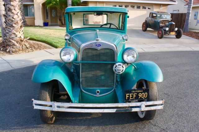 Green 1930 Ford Model A Coupe with White / Green interior