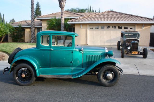 Green 1930 Ford Model A Coupe with White / Green interior