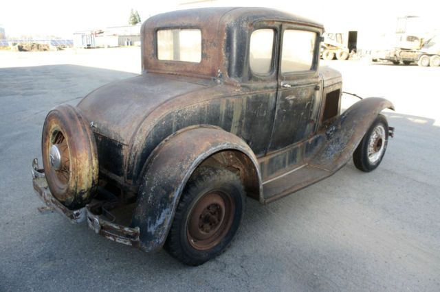 Black 1930 Ford Model A Coupe with Black interior