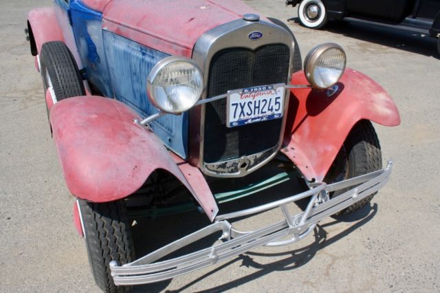 Red/White/Blue 1930 Ford Model A Roadster with Blue interior