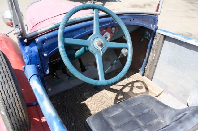 Red/White/Blue 1930 Ford Model A Roadster with Blue interior