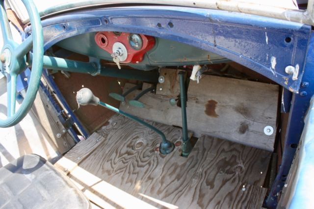 Red/White/Blue 1930 Ford Model A Roadster with Blue interior