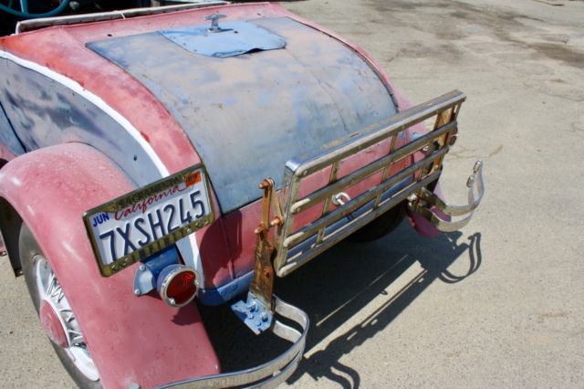 Red/White/Blue 1930 Ford Model A Roadster with Blue interior