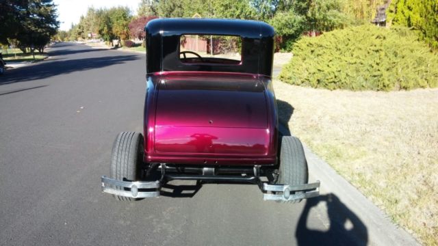 Red 1931 Ford Model A Coupe with Burgundy interior