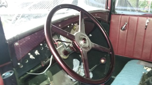 Red 1931 Ford Model A Coupe with Burgundy interior