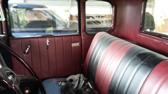 Red 1931 Ford Model A Coupe with Burgundy interior
