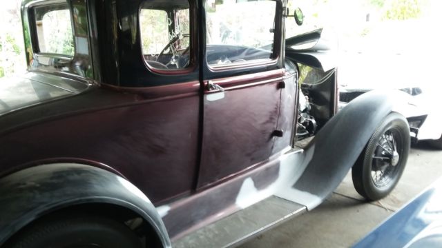 Red 1931 Ford Model A Coupe with Burgundy interior