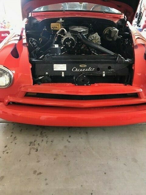 Orange 1954 Chevrolet 350ci with air Sedan