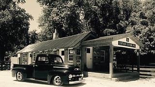 Black 1952 Ford F-100 Cab & Chassis with Brown interior