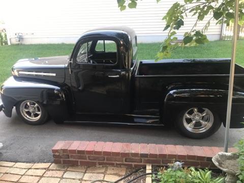 Black 1952 Ford F-100 Cab & Chassis with Brown interior