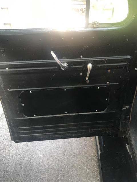 Black 1952 Ford F-100 Cab & Chassis with Brown interior