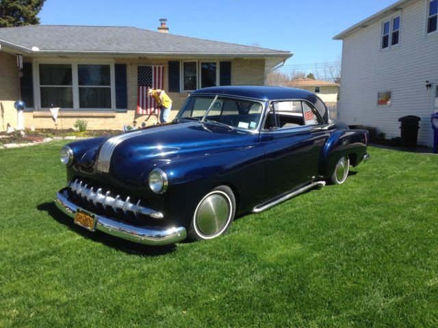 Blue 1952 Ford 2 door coupe Hard Top with Gray interior