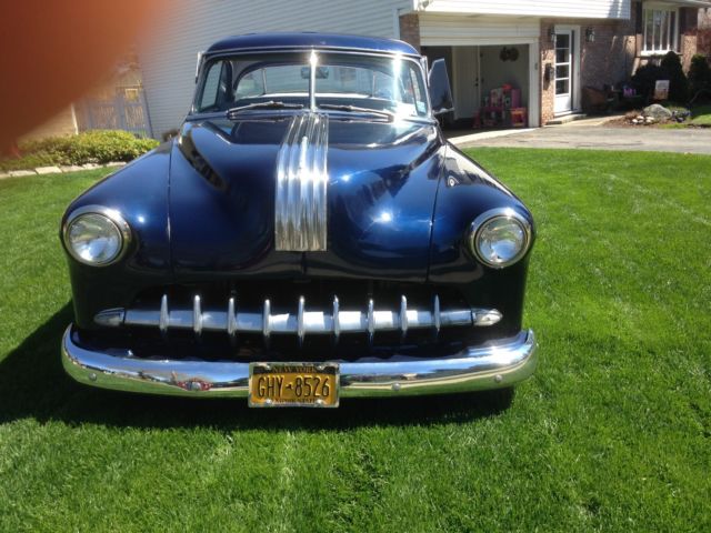 Blue 1952 Ford 2 door coupe Hard Top with Gray interior