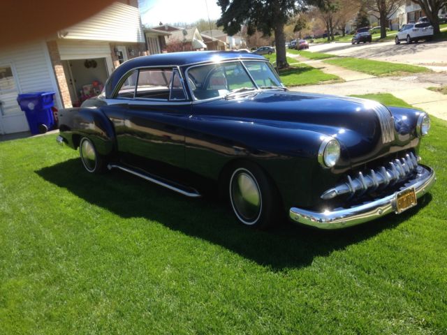 Blue 1952 Ford 2 door coupe Hard Top with Gray interior