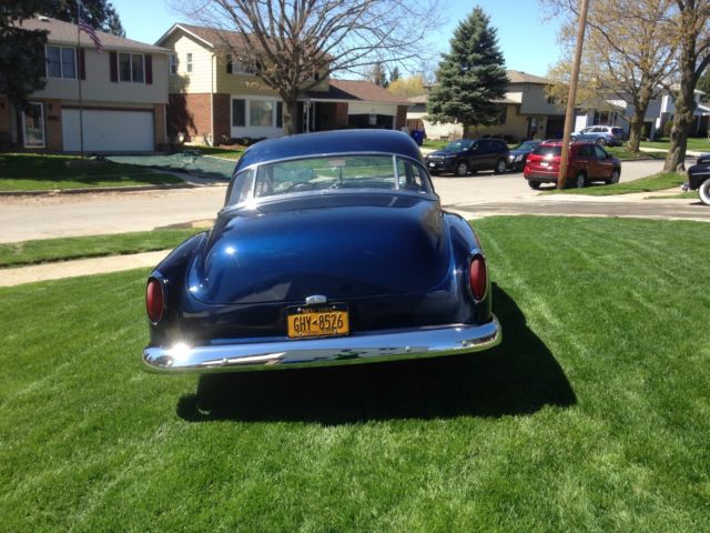 Blue 1952 Ford 2 door coupe Hard Top with Gray interior