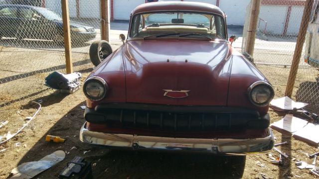 red 1954 Chevrolet Bel Air/150/210 2 door post