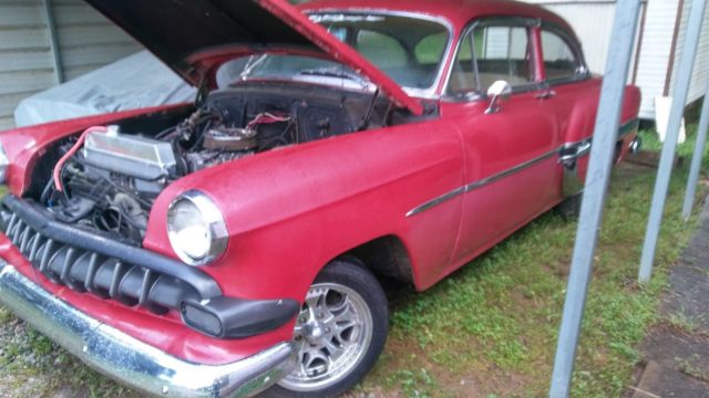red 1954 Chevrolet Bel Air/150/210 2 door post