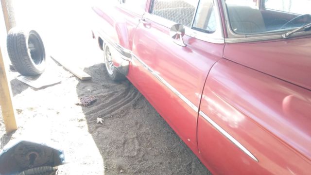 red 1954 Chevrolet Bel Air/150/210 2 door post