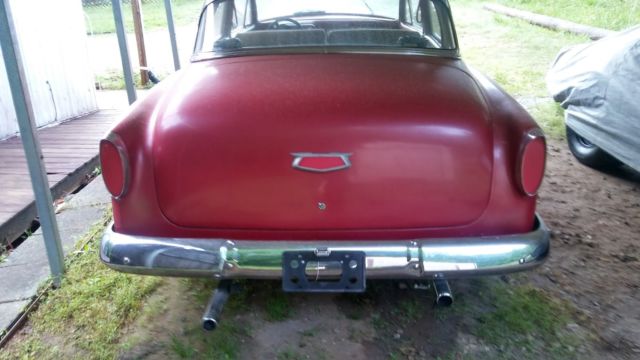 red 1954 Chevrolet Bel Air/150/210 2 door post