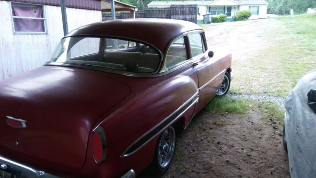 red 1954 Chevrolet Bel Air/150/210 2 door post