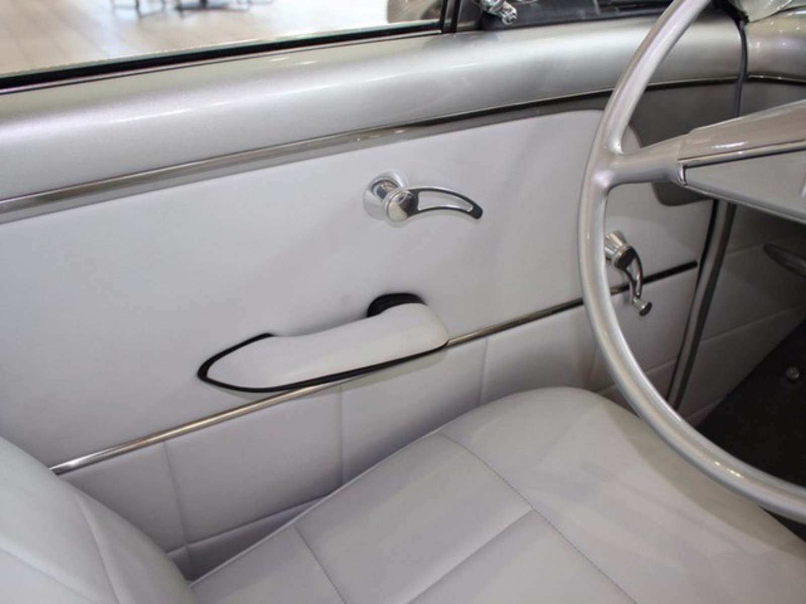 Silver 1954 Ford Crestline with Gray interior