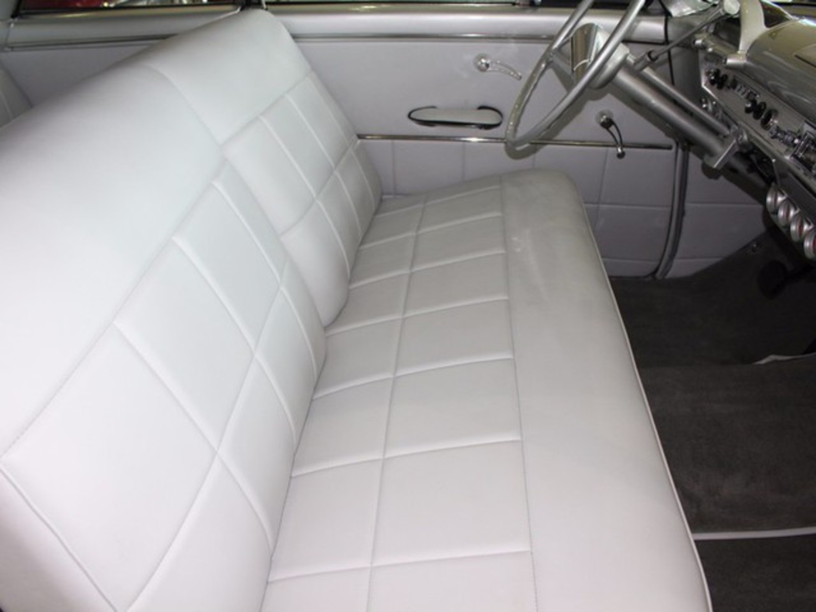 Silver 1954 Ford Crestline with Gray interior