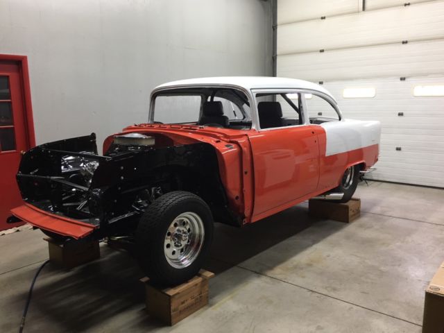 Orange 1955 Chevrolet Bel Air/150/210 2 Door Sedan with none interior