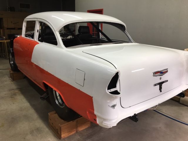 Orange 1955 Chevrolet Bel Air/150/210 2 Door Sedan with none interior