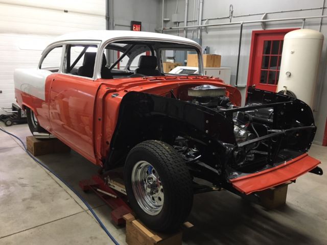 Orange 1955 Chevrolet Bel Air/150/210 2 Door Sedan with none interior