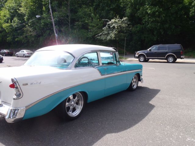 Blue 1956 Chevrolet Bel Air/150/210 Coupe with Green interior