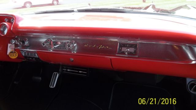 Black 1957 Chevrolet Bel Air/150/210 with Red interior
