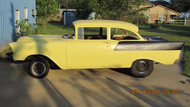 Yellow 1957 Chevrolet Bel Air/150/210