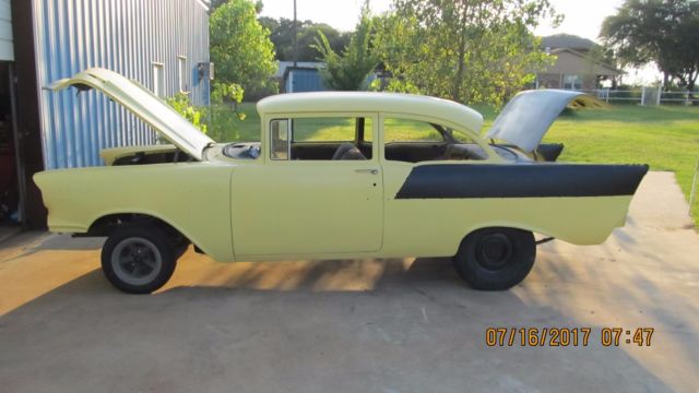 Yellow 1957 Chevrolet Bel Air/150/210