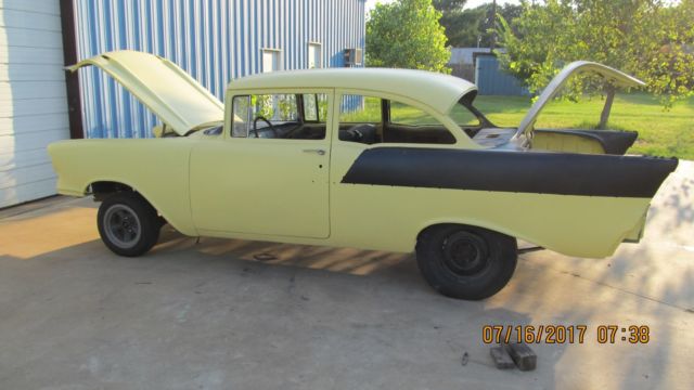Yellow 1957 Chevrolet Bel Air/150/210